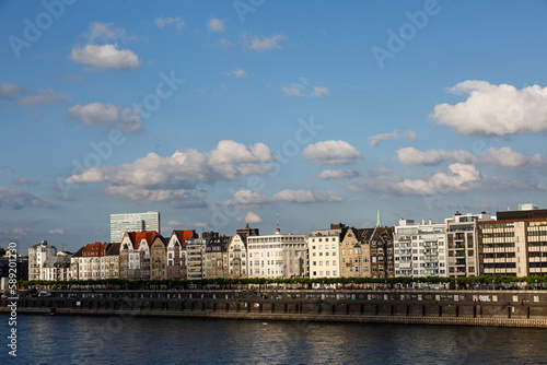 View to the city, river shore and clound in blue sky © rninov