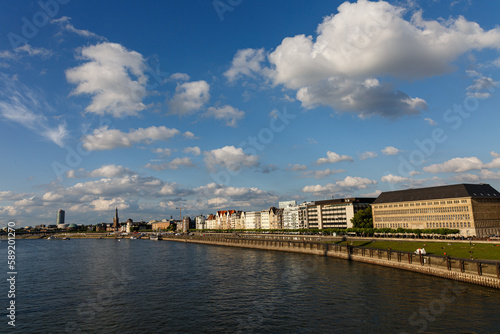 View to the city, river shore and clound in blue sky