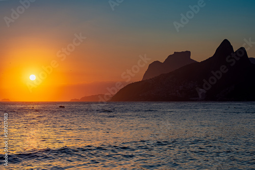 Sunset or sunrise at arpoador beach photo