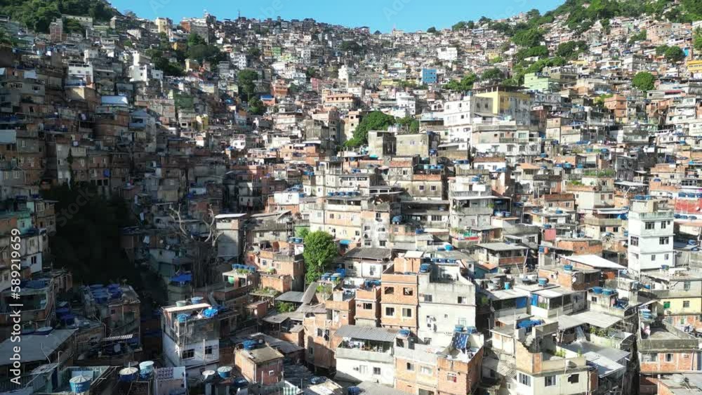 Favela da Rocinha, the Biggest Slum (Shanty Town) in Latin America. Located in Rio de Janeiro, Brazil, it has more than 70,000 inhabitants. Favela da Rocinha, the Biggest Slum (Shanty Town) in Latin America. Located in Rio de Janeiro, Brazil, it has more than 70,000 inhabitants.
