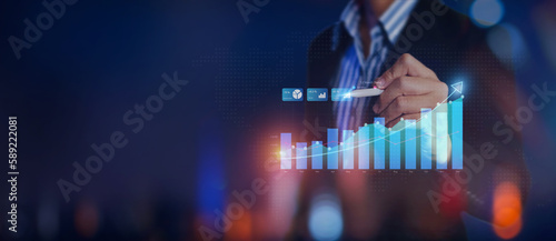 Businessman showing result of growth company profit planning, opportunity, challenge and business strategy graphs and target of business. Banner of plan and visions for financial and economy analysis.