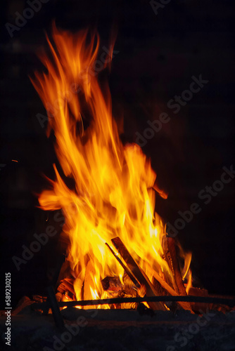 burning hot fireplace. high flames background. cooking on open fire concept