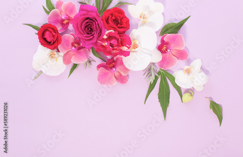 pattern of summer flowers on color paper background