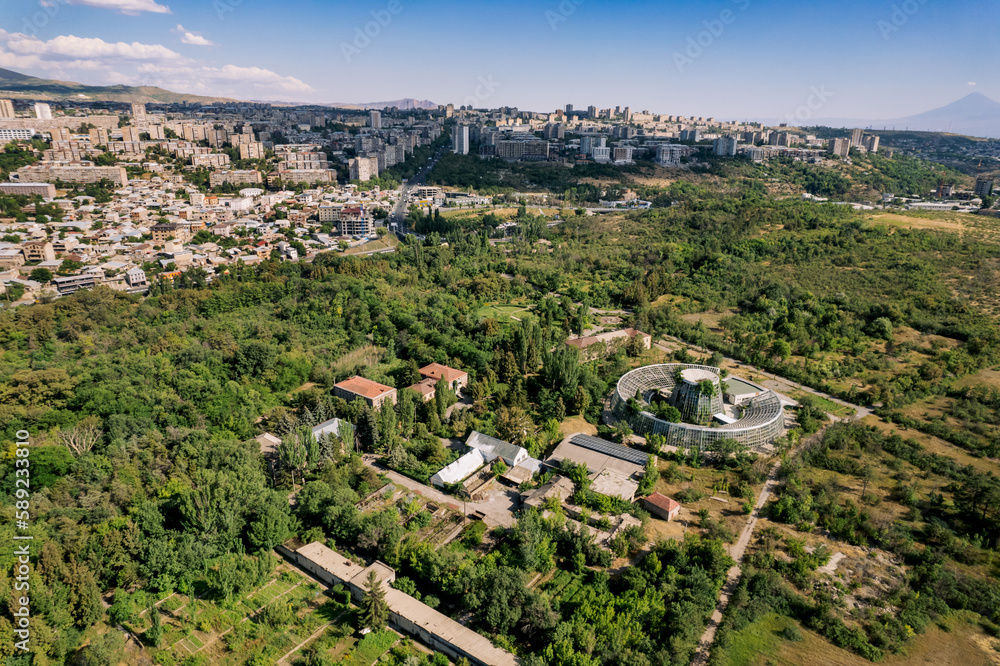 Aerial view of the summer botanical garden in Yerevan, Armenia, with a blue sky