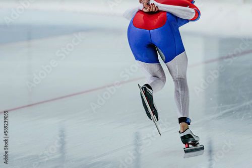 back female skaters running rink in speed skating competition, winter sports games