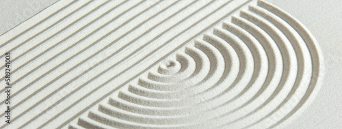 Japanese ZEN garden with stone in textured sand