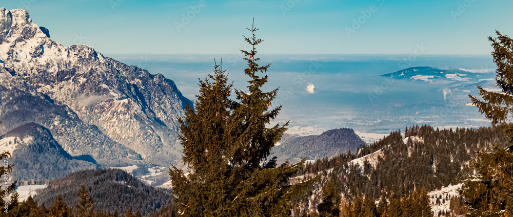 Winter view with Salzburg in the distance at the Rossfeld panorama road near Berchtesgaden, Bavaria, Germany