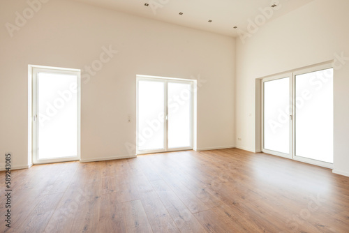 empty room in residential home with open windows © Wolfilser