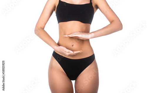 Woman, stomach, ache. Health care concept, closeup. Young multi-ethnic woman's stomach. Closeup woman hands made protect shape stomach. Stomach bowel good digestion food woman's medical health