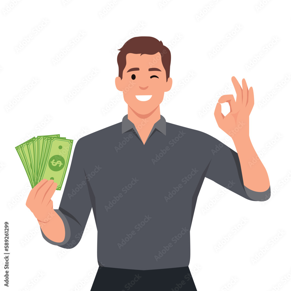 Happy young man holding cash or money or banknotes and gesture okay sign. Financial money concept. Happy young man holding cash or money or banknotes and gesture okay sign. Financial money concept.