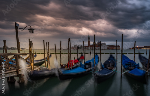 Sunset with gondolas, Venezia, Italy © Herman