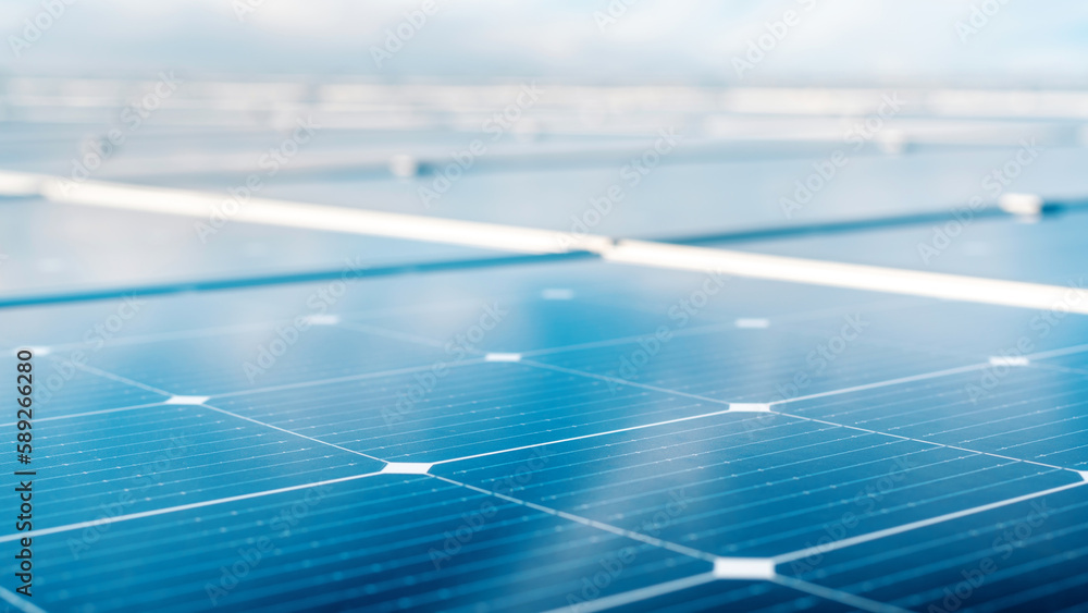 Multiple solar panels on the roof of a manufacturing building