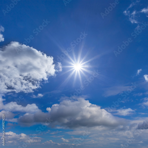 sparkle sun on dense  cumulus clouds background