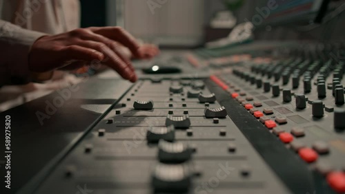 Sound engineer used digital audio mixer Sliders Engineer presses keys Control panel Recording studio technician