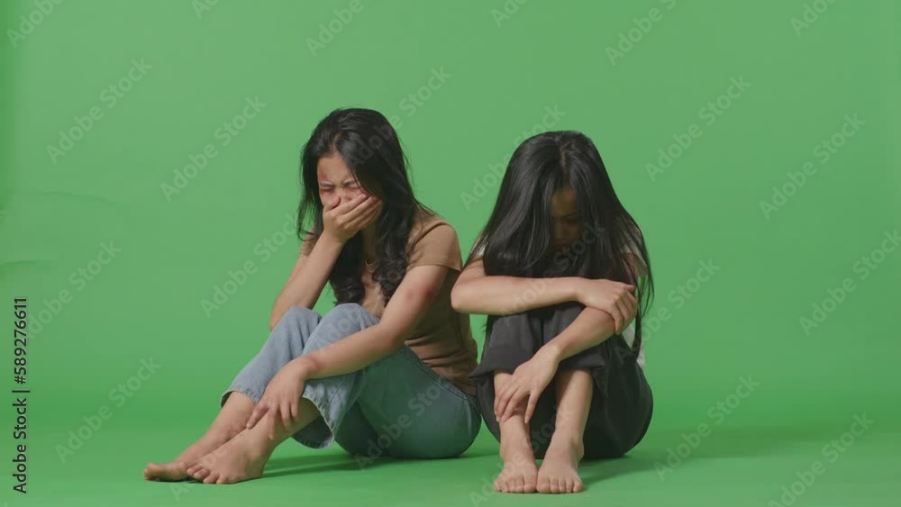 Full Body Of Young Asian Women Victims Of Violence With Bruise On Bodies Crying While Sitting In The Green Screen Background Studio
Full Body Of Young Asian Women Victims Of Violence With Bruise On Bodies Crying While Sitting In The Green Screen Background Studio