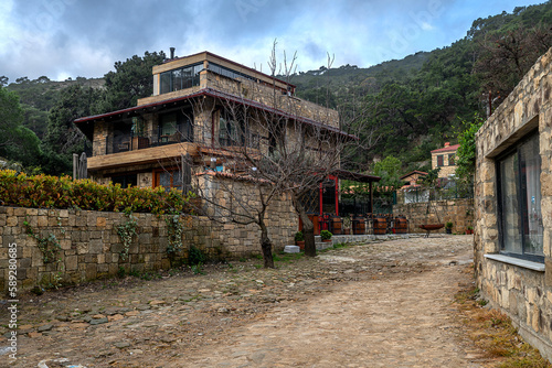 The houses in Yeşilyurt Village, where both sea and mountain tourism are experienced together with dense vegetation on the skirts of Kaz Mountains, photo