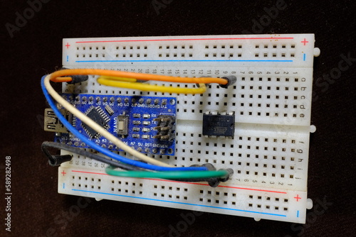 microcontroller programmed using development board on a breadboard