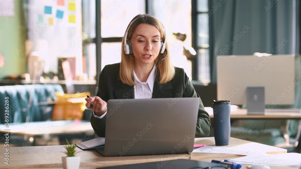 Young woman is working in the office, having online call, consultation. Young woman is working in the office, having online call, consultation.