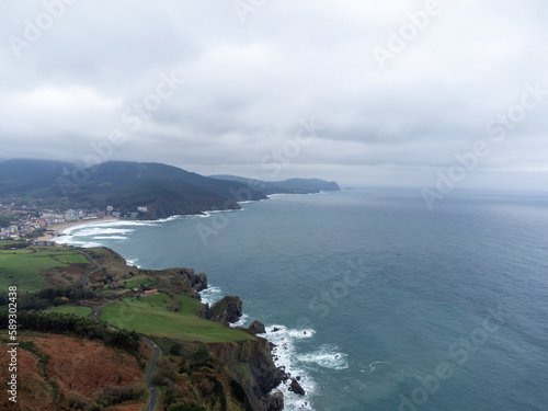 Atlantic ocean coastline near famous landmark and film location in North of Spain, ocean islet with chapel San juan de Gaztelugatxe, Basque Country, Spain in winter © barmalini