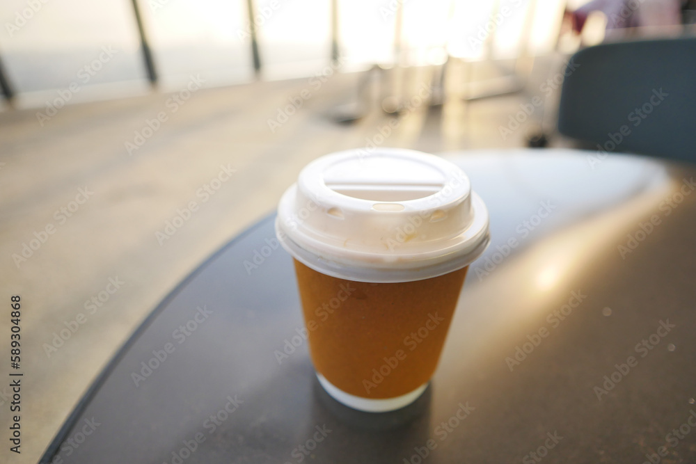 take away paper coffee cup o on cafe table take away paper coffee cup o on cafe table