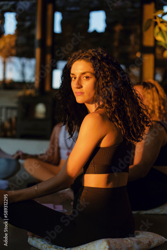 Portrait of woman in retreat center at sunset