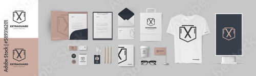 Branding design template in minimal style with geometric shield form logo and brown background. Corporate identity presentation for modern company, set of folder and A4 form, business card, envelope