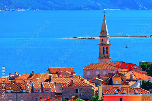 Citadel of Old Town in Budva Montenegro . Tiled roofs at Adriatic Sea coast  photo