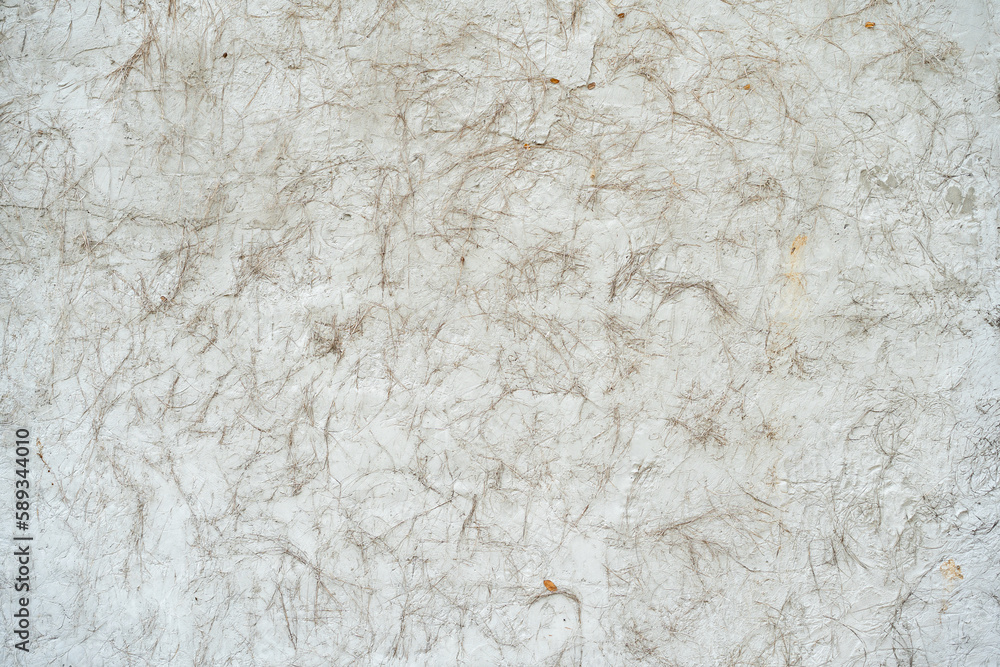 Grey rough wall texture concrete like stone with a mixture of rice straw dry hay. Grey rough wall texture concrete like stone with a mixture of rice straw dry hay.
