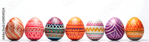 Row of colorful or dyed easter eggs, hand painted