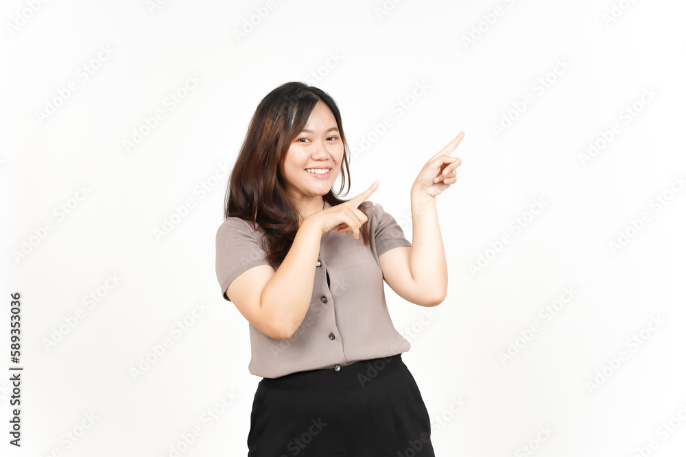 Showing Product and Pointing Blank Side using forefinger Of Beautiful Asian Woman Isolated On White Background Showing Product and Pointing Blank Side using forefinger Of Beautiful Asian Woman Isolated On White Background