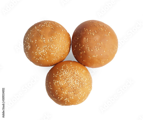 Fresh tasty buns with sesame seeds isolated on white, top view photo