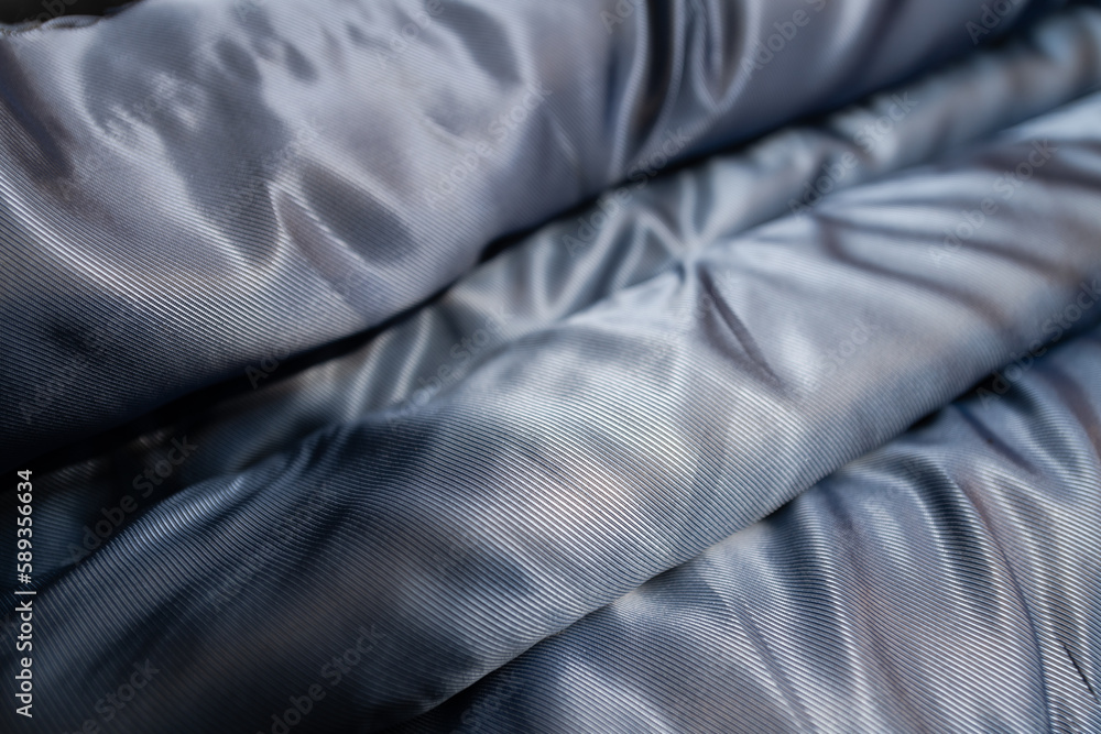 Collection of fashionable fabrics. Samples of different natural fabrics for sewing a fashion collection of clothes. Large selection of fabrics in the store or tailor warehouse. Collection of fashionable fabrics. Samples of different natural fabrics for sewing a fashion collection of clothes. Large selection of fabrics in the store or tailor warehouse.