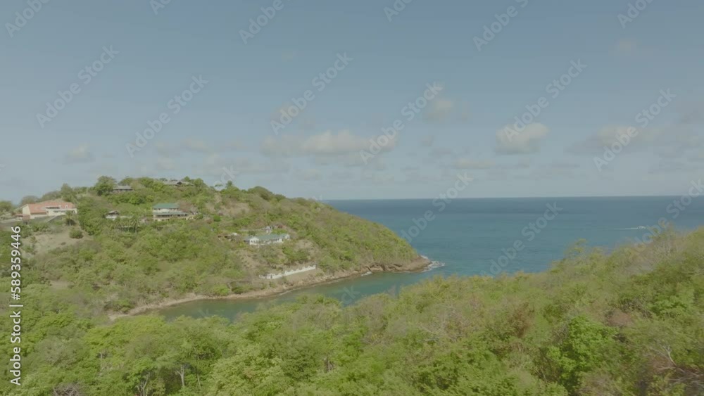 Homes nestle into the hillside of St. Lucia Homes nestle into the hillside of St. Lucia
