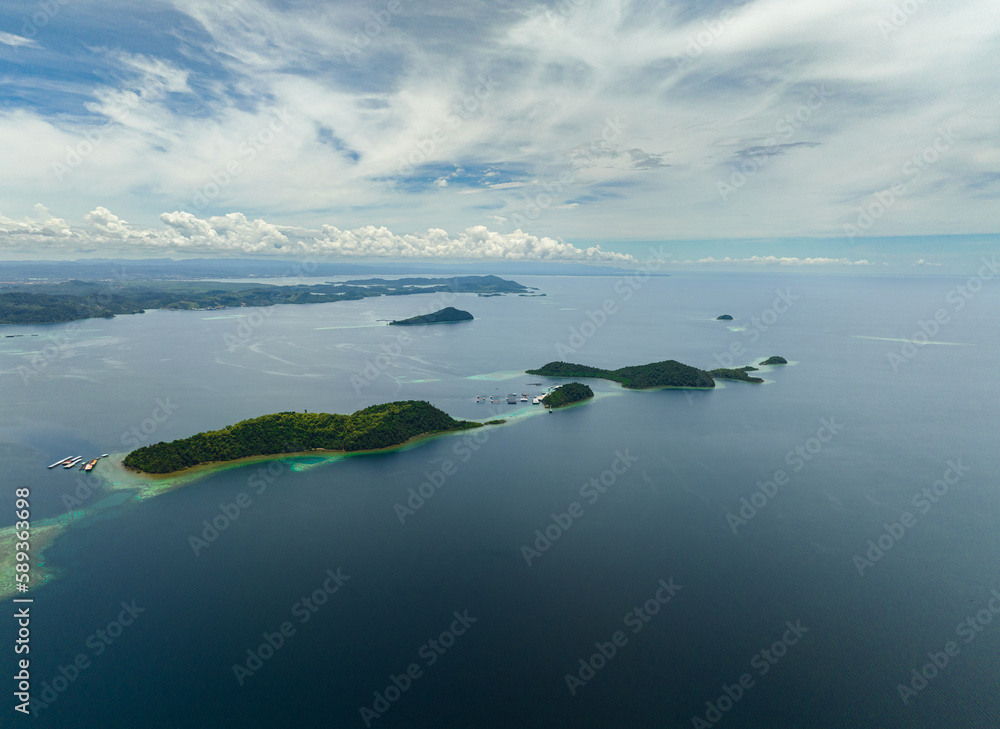 Aerial drone of tropical islands in the sea. Borneo, Sabah, Malaysia.