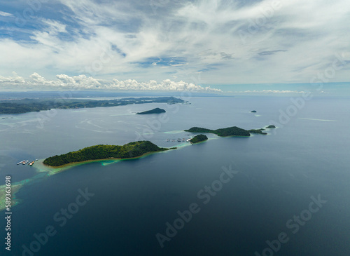 Aerial drone of tropical islands in the sea. Borneo, Sabah, Malaysia.