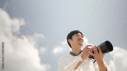 カメラマンの男性