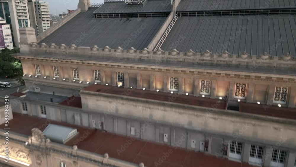 Aerial Drone Fly Above Columbus Theater and Obelisk of Buenos Aires Downtown at Dusk, Teatro Colon Aerial Drone Fly Above Columbus Theater and Obelisk of Buenos Aires Downtown at Dusk, Teatro Colon
