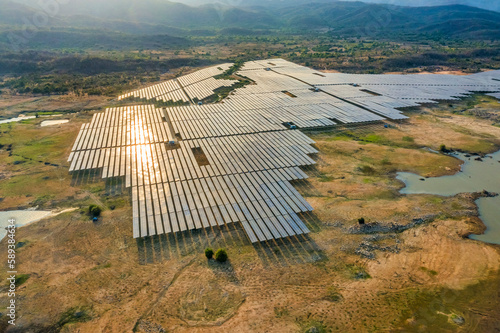 Aerial view of Solar panel, photovoltaic, alternative electricity source - concept of sustainable resources on a sunny day, Song Bieu lake, Ninh Thuan, Vietnam photo