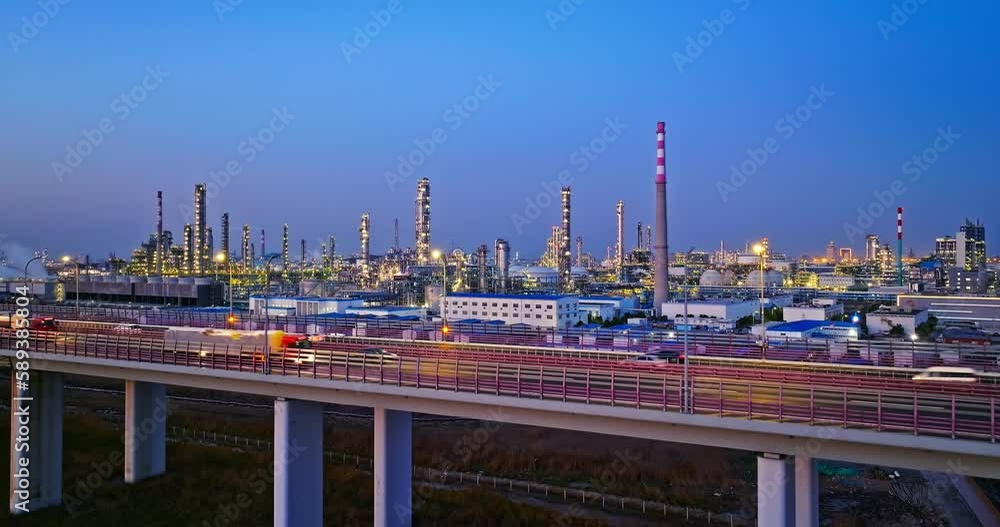 Drone cross highways to shooting industrial buildings at night Drone cross highways to shooting industrial buildings at night