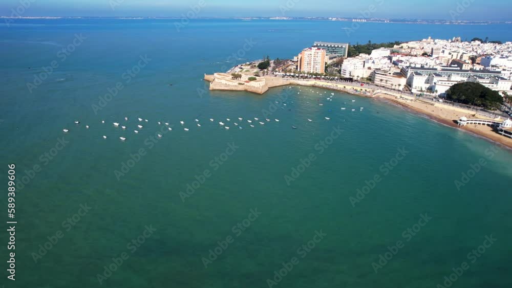 Aerial view of ome fisher boats anchored in front of the Cadiz Shoreline in Andalucia, Spain. Aerial view of ome fisher boats anchored in front of the Cadiz Shoreline in Andalucia, Spain.