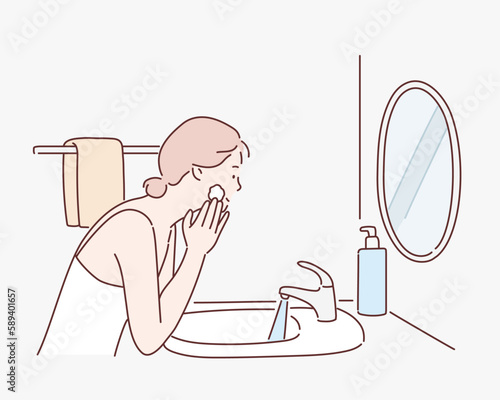 Woman Using Cosmetic Cleansing Gel or Facial Wash to Clean Her Face. Hand drawn style vector design illustrations.