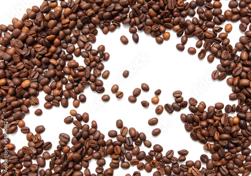 Roasted coffee beans isolated on white background.