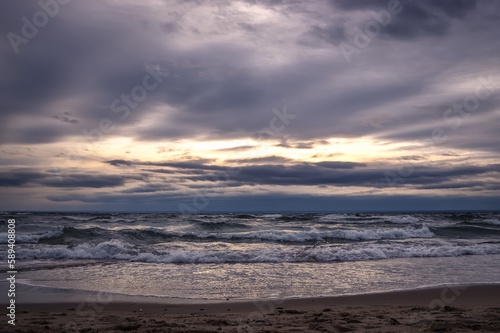 Cloudy winter seaside landscape. Cloudy day on the beach in Gdynia  Poland.