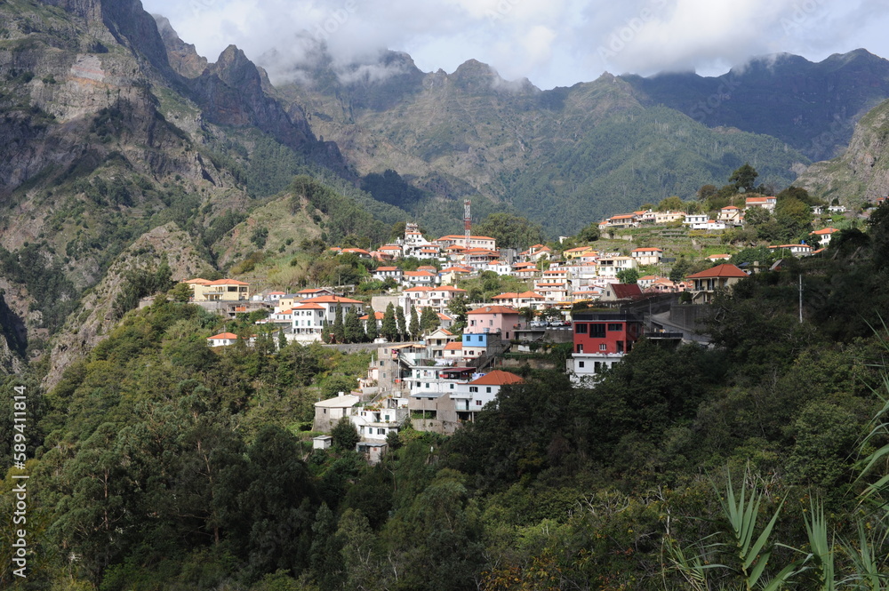 A beautiful natural landscape of Valley of Nuns (Curral das Freiras) with a scenic village in a mountain valley on the island of Madeira, Portugal, Europe