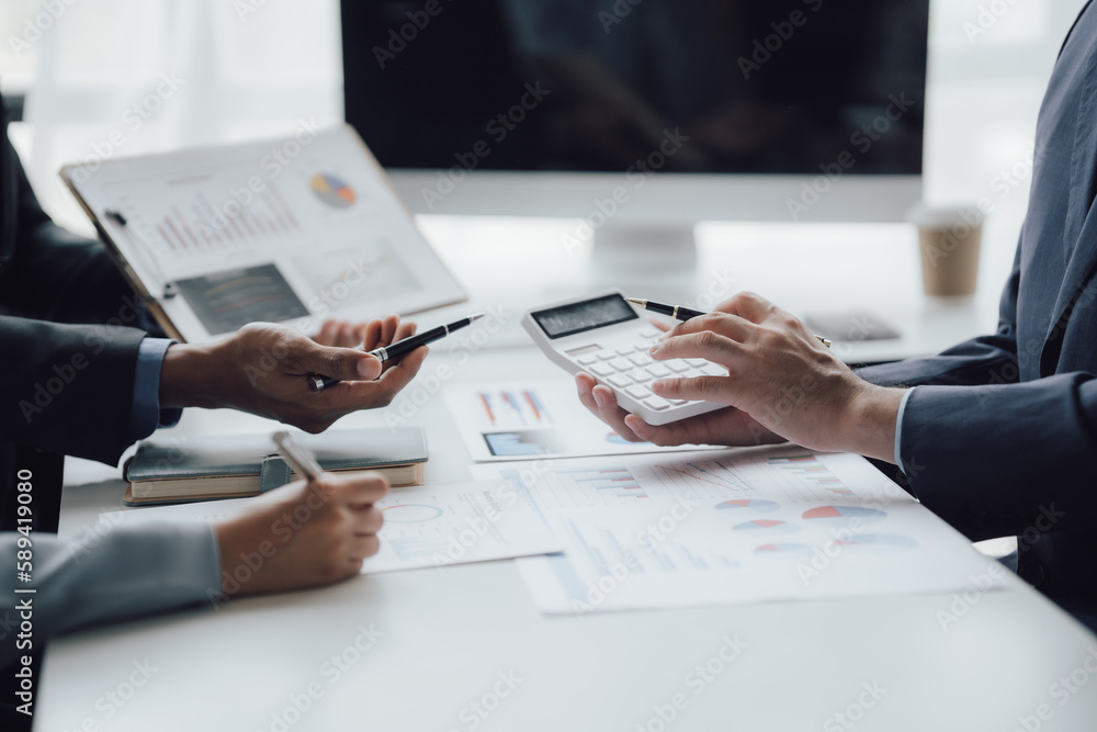 Fototapeta premium business adviser meeting to analyze and discuss the situation on the financial report in the meeting room.Investment Consultant, Financial advisor and accounting concept