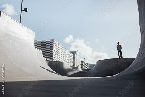 Man skateboarding in skate park