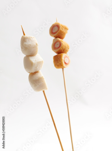 Close up shot of street food: sate lok lok. Asian street food isolated on white background
