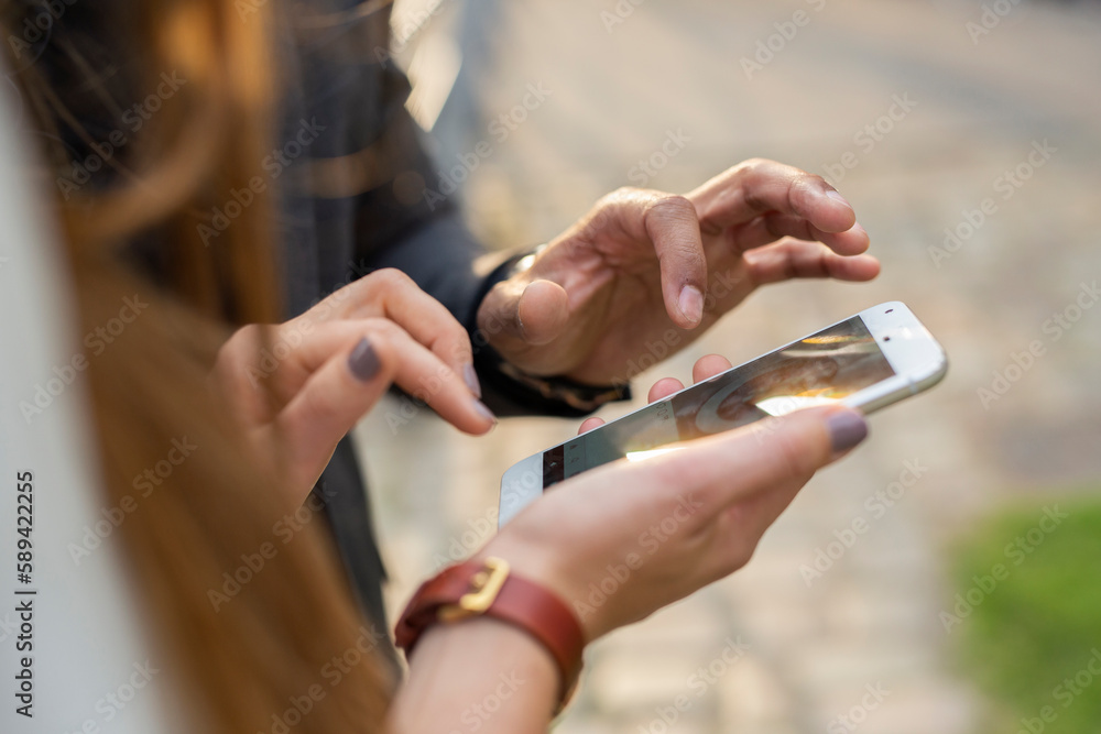 Man and woman using smart phone Man and woman using smart phone