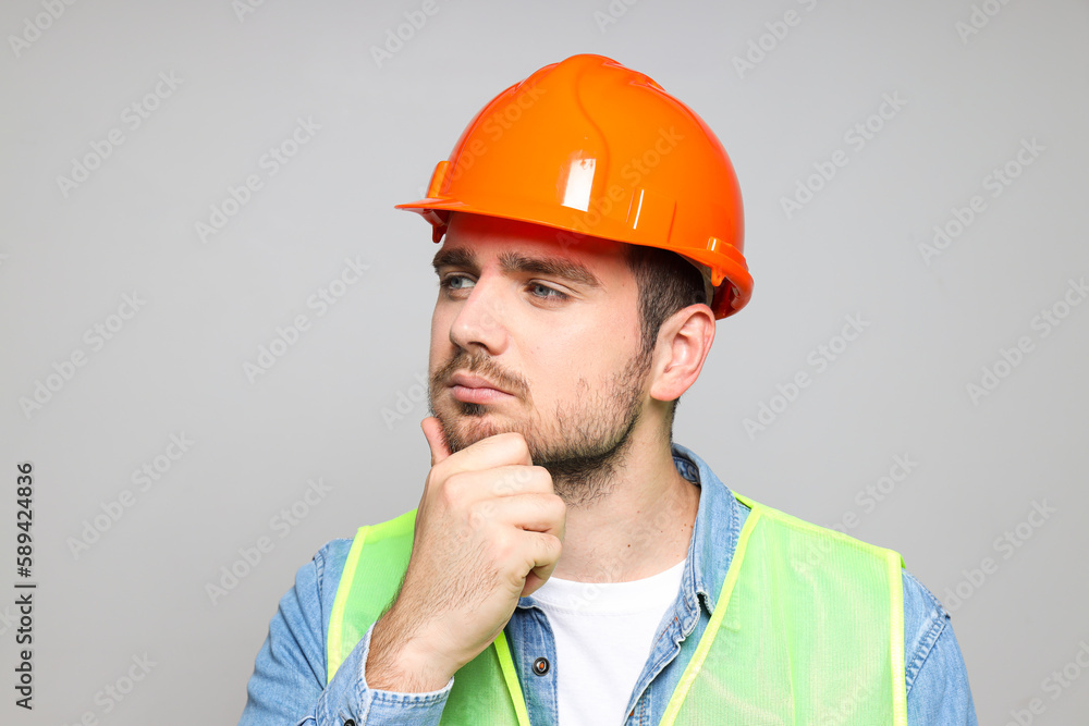 Young man civil engineer in safety hat Young man civil engineer in safety hat