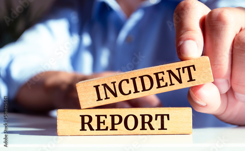 Wooden blocks with words 'Incident report'. Business concept photo